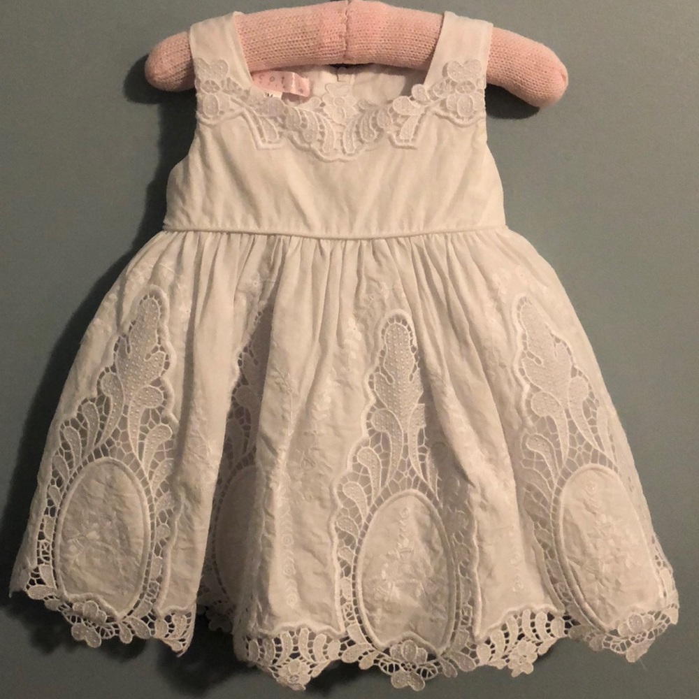 White eyelet poofy baby dress and cap